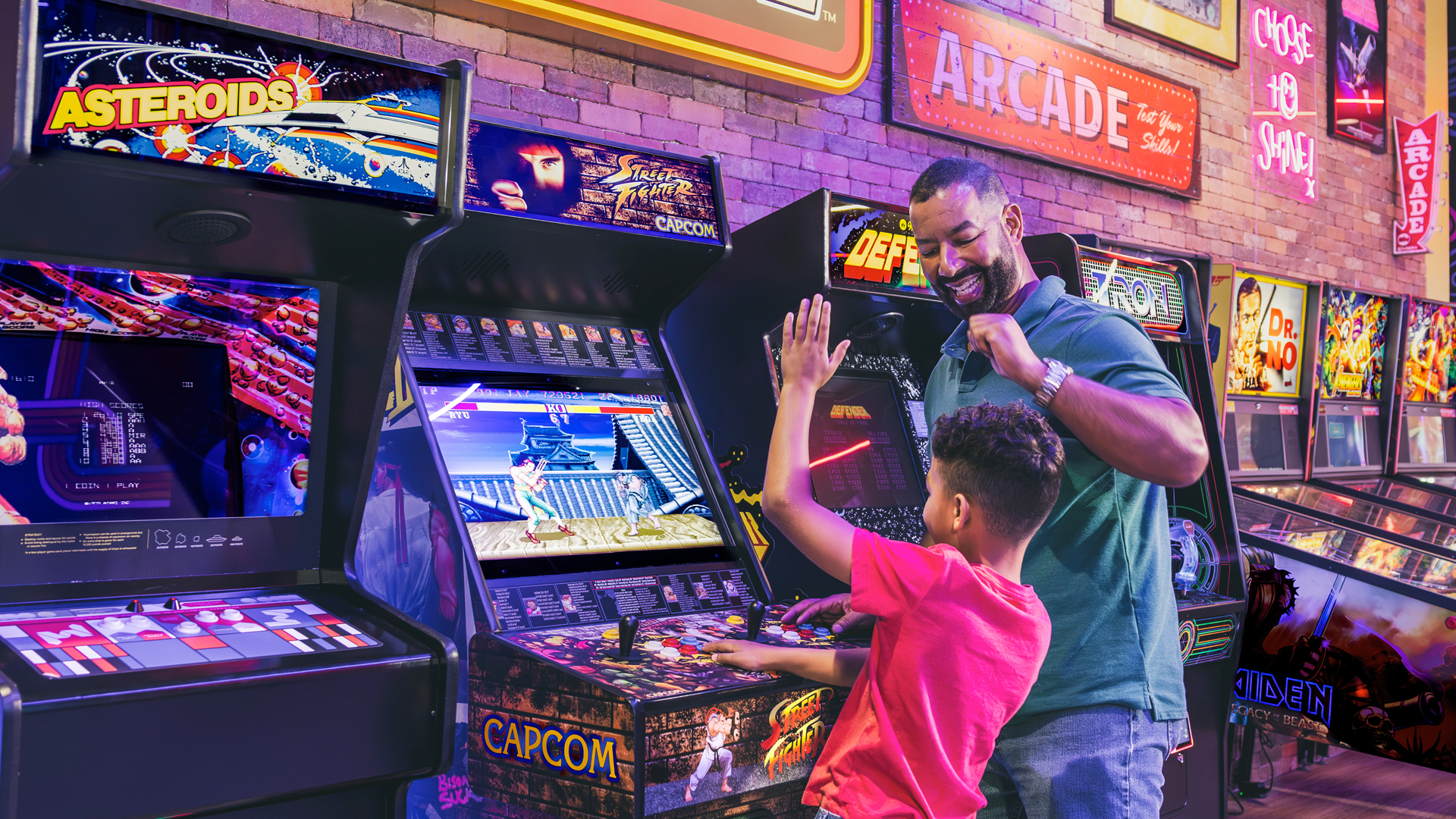 Family at Orlando Arcade | Mystery Fun House Arcade Experience, powered by Chuck E. Cheese